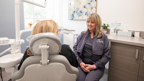 Coral Springs dental team member smiling at a patient