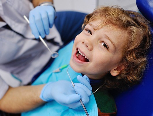 Young boy getting dental checkup