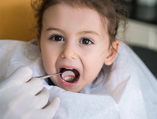 young girl having a checkup done