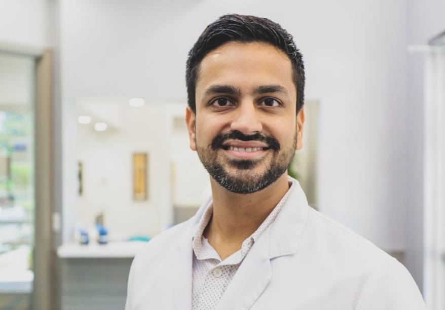 Dr. Bidkar smiling