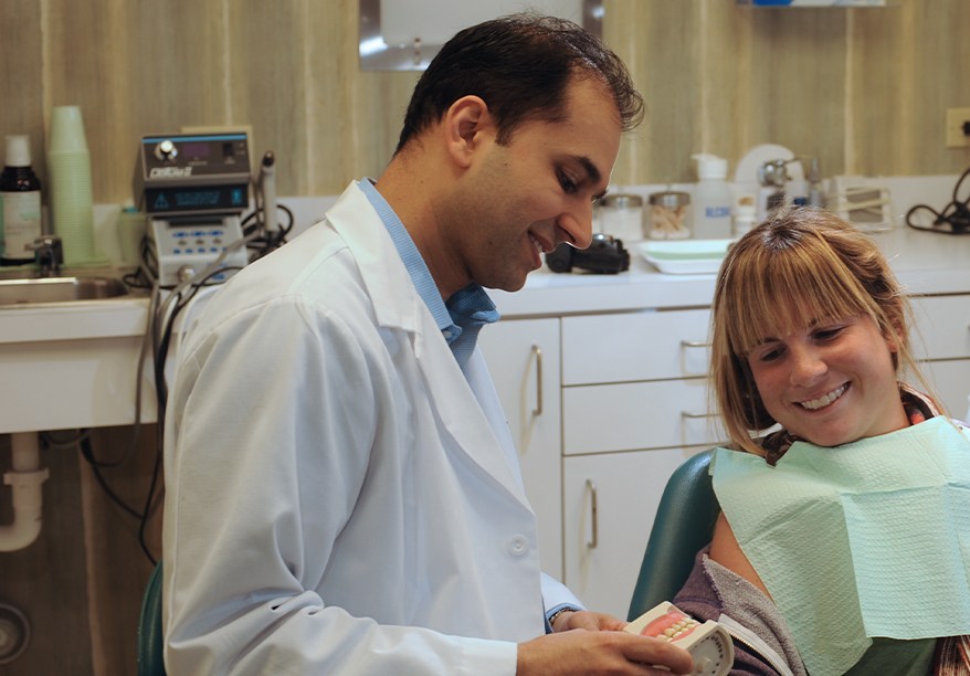 Dr. Ghodsi working with female patient