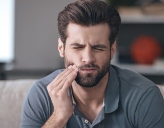 handsome man with toothache