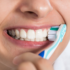 Person brushing their teeth