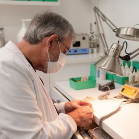 Coral Springs dentist working in a dental lab