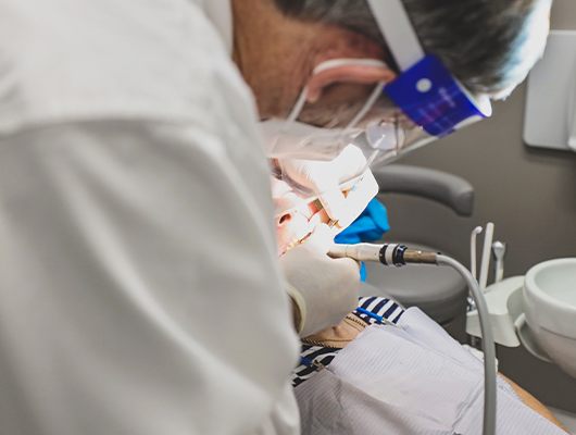 Coral Springs dentist performing scaling