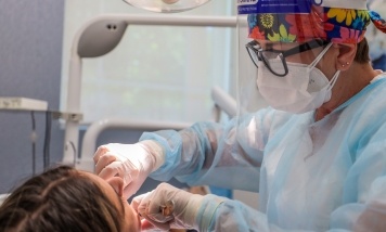 dentist doing preventive work on patient