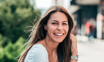 woman smiling outside