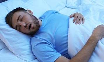 man asleep with his mouth open