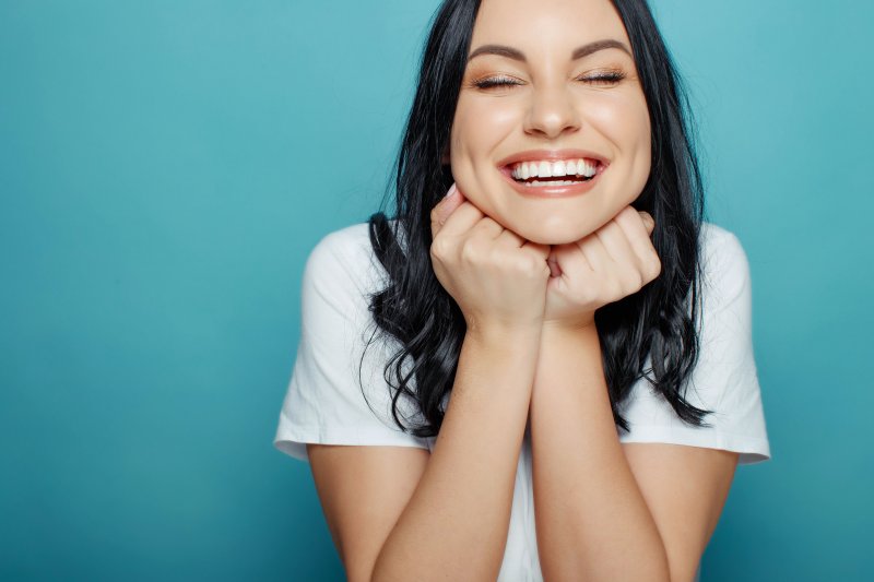 Woman after seeing cosmetic dentist in Coral Springs